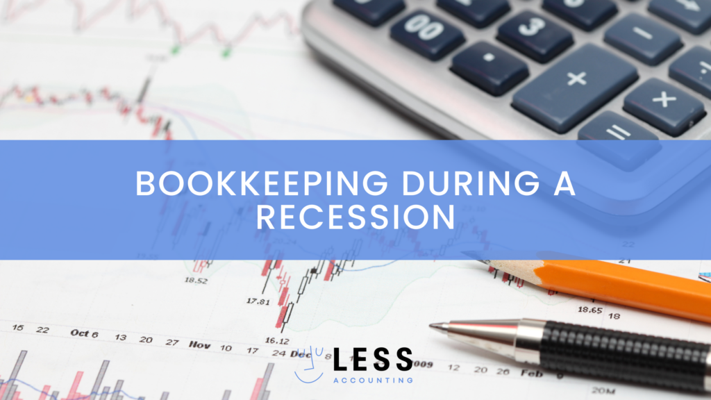 Bookkeeping during a recession. A downturned graph of finances and calculator lay on a table.